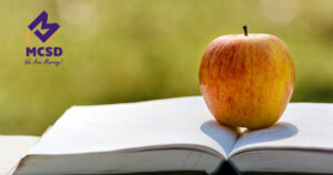 apple on a book