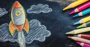 chalk rocket and pencils